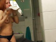 Hot Redhead Milf in Bathroom-Spy Cam Clip