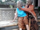 2 Very old grannies kissing